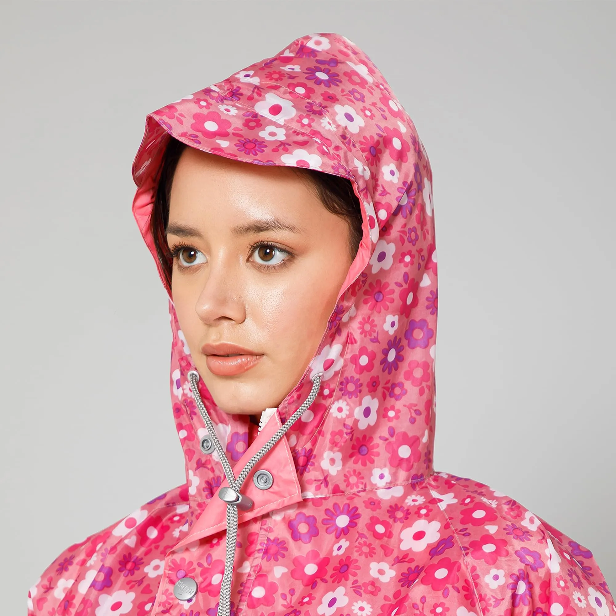 THE CLOWNFISH Polyester Waterproof Rain Coat For Women Skirt and Top Raincoat With Adjustable Hood and Front Pockets Rain Glam Series (Pink Floral, XX-Large)